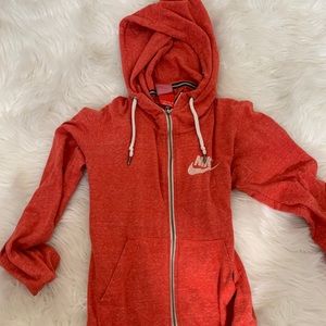 Orange-ish red Nike sweater